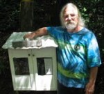 Patrick Edmondson and his Little Free Library