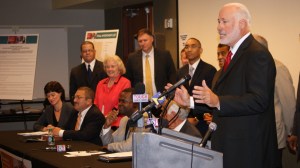 Bucky Johnson presides over a press conference after the adoption of a $6.14 billion proposed transportation list. Credit: Barry Golivesky, Atlanta Regional Commission