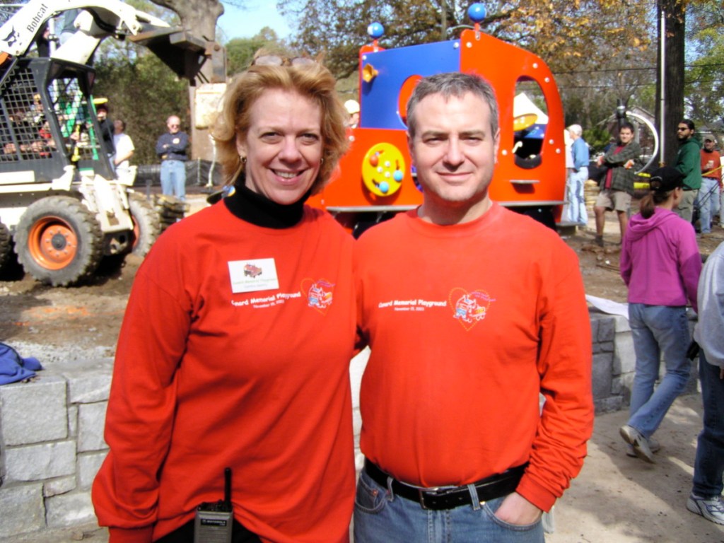 Cynthia Gentry and Brad Cunard at playground installation in 2003.